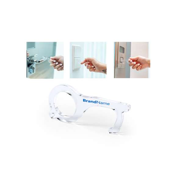 Llavero higiénico anti-contacto, fabricado en original y resistente material acrílico de acabado transparente. Especialmente diseñado para evitar tocar con las manos superficies de uso común (picaportes de puertas, interruptores, grifos de uso público, cajeros automáticos...). Con cómodo troquel para el dedo y presentado en bolsa individual de diseño. Recomendado para marcaje en tampografía.