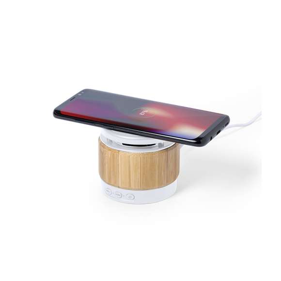 Altavoz Bluetooth® de línea nature con cargador inalámbrico integrado 5W y diseño compacto. Fabricado en combinación de materiales bambú y ABS, de elegante acabado bicolor. Conexión Bluetooth® 5.0 y 3W de potencia. Recargable mediante cable USB -de 150 cm incluido- y presentado en una atractiva caja de diseño eco. disponible manual de instrucciones en español e inglés.