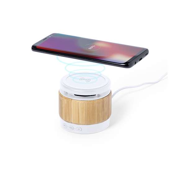Altavoz Bluetooth® de línea nature con cargador inalámbrico integrado 5W y diseño compacto. Fabricado en combinación de materiales bambú y ABS, de elegante acabado bicolor. Conexión Bluetooth® 5.0 y 3W de potencia. Recargable mediante cable USB -de 150 cm incluido- y presentado en una atractiva caja de diseño eco. disponible manual de instrucciones en español e inglés.