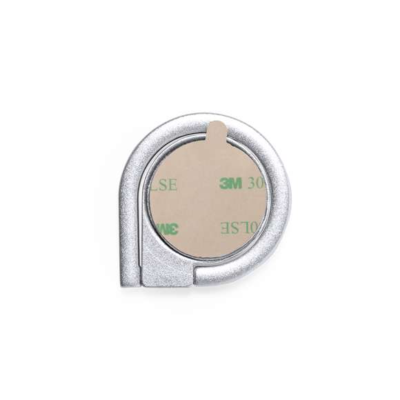 Soporte metálico para smartphone en acabado mate. De elegante diseño y con adhesivo 3M, de fijación extra fuerte y libre de residuos al despegarlo del dispositivo. Con anilla soporte posterior para dedo y presentado en bolsita individual de diseño.