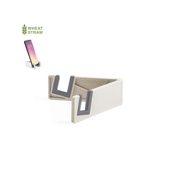 Soporte para dispositivo móvil de línea nature. Fabricado en caña de trigo/PP, para así fomentar la utilización de materias primas naturales y reducir las emisiones contaminantes.Patas plegables con topes antideslizantes en PVC, especialmente diseñado para marcaje en tampografía.