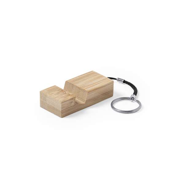 Llavero soporte de línea nature para smartphone. Fabricado en resistente bambú de acabado lacado, con resistente cordón y anilla metálica.