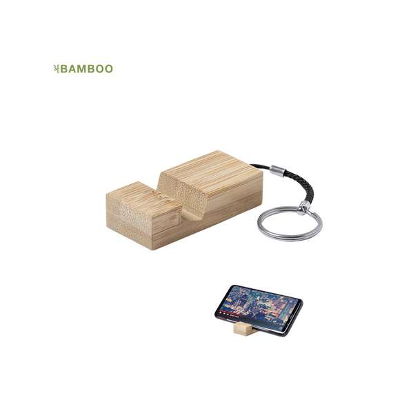 Llavero soporte de línea nature para smartphone. Fabricado en resistente bambú de acabado lacado, con resistente cordón y anilla metálica.