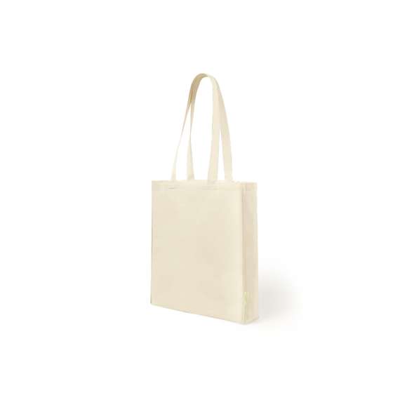 Bolsa de línea nature en algodón orgánico de 140g/m2. Asas largas en algodón orgánico, de 70 cm y reforzadas. Acabado cosido y resistencia de hasta 8kg de peso, con distintivo algodón orgánico en la etiqueta.