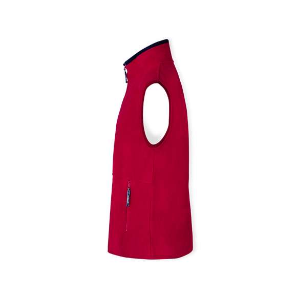 Chaleco en cálido y suave polar fleece de 280g/m2 con tratamiento anti-pilling. Con cuello de interior en color, cierre de cremallera con cinta en tirador, bolsillos laterales de cremallera y cintura elástica. Disponible en tallas M, L, XL, XXL.