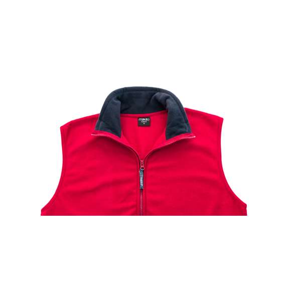 Chaleco en cálido y suave polar fleece de 280g/m2 con tratamiento anti-pilling. Con cuello de interior en color, cierre de cremallera con cinta en tirador, bolsillos laterales de cremallera y cintura elástica. Disponible en tallas M, L, XL, XXL.