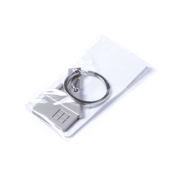 Llavero metálico con divertido diseño de casa en elegante acabado mate. Con cuerpo especialmente diseñado para marcaje en láser.