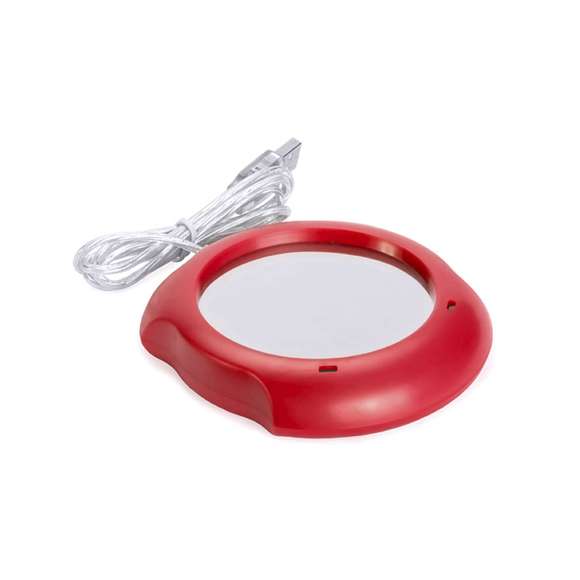Calentador de tazas con conexión USB y de superficie metálica, especialmente diseñada para mantener el calor. De elegante diseño en color gris y compatible con tazas de hasta 7,4cm de diámetro, incorpora interruptor en la parte trasera y luces de estado. Presentada en caja individual.
