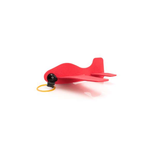 Avioneta desmontable con cuerpo en suave EVA de vivos colores y elástico de lanzamiento. Presentada en pastilla plana para fácil marcaje.