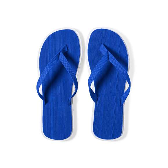 Par de chanclas con gruesa suela en resistente EVA de acabado bicolor y tira de nylon a juego en variada gama de vivos colores. Disponibles en tallas 36-38, 42-44.